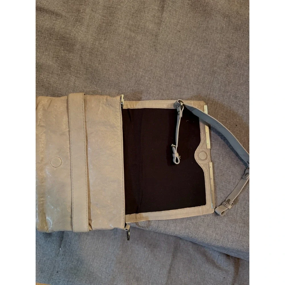 Beautiful Cream leather clutch with detachable shoulder strap by Kenneth Cole